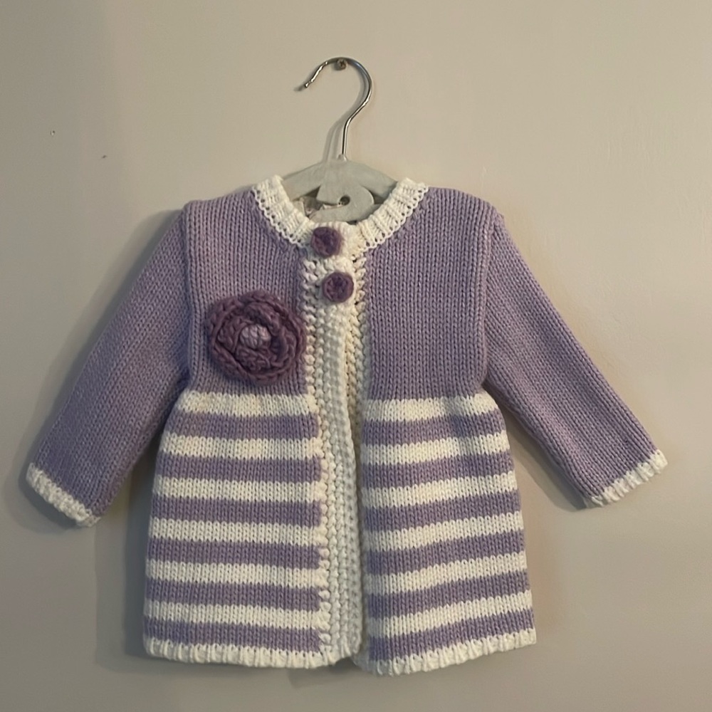 Huggalugs adorable purple & white, hand knit 12-18 months sweater.